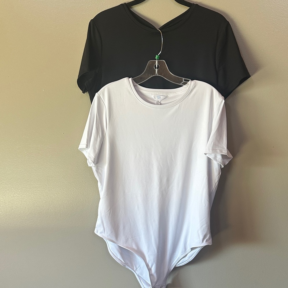 2 for 1 price! 1 black, 1 white. Sz XL each. Short Sleeve Bodysuits